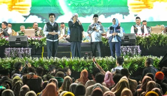 
					Malam puncak peringatan Bulan Pengurangan Risiko Bencana (PRB) 2025 di Lapangan Trowulan, Kabupaten Mojokerto, Kamis (2/10/2025). Dok.humas