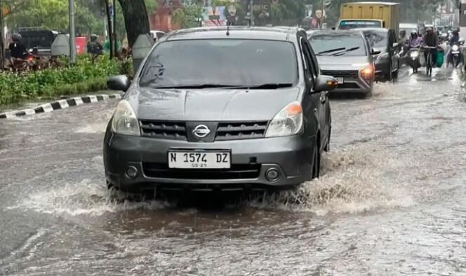 
					Banjir di Malang