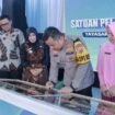 Kapolres Jombang saat penandatanganan prasasti ketiga SPPG