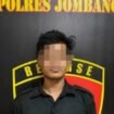 tersangka saat diamankan di Satreskrim Polres Jombang